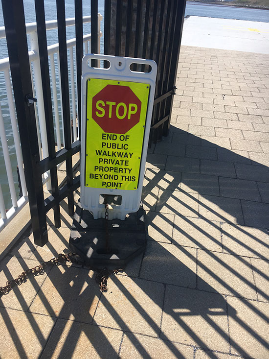 The Hudson River Waterfront Walkway ends prematurely at the Bayonne Golf Club where people using the public walk are met with a fence and sign reading "private property beyond this point."